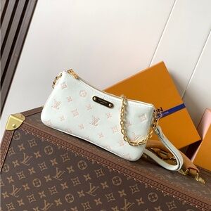 Louis Vuitton Cream and Pink Clutch